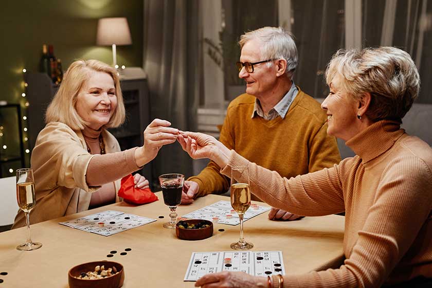 Old people playing board game